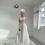 Thumbnail: White tulle beaded bridal gown