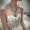 Thumbnail: Satin and tulle bridal gown with train