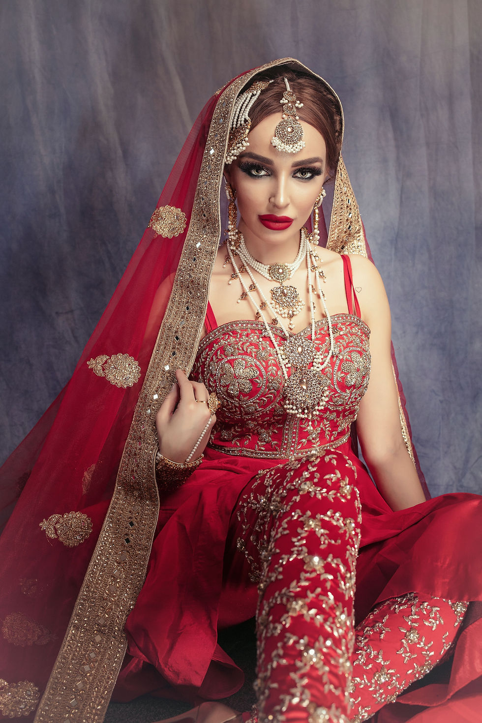 Thumbnail: Red waterfall gown with embroidered leggings