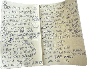 Open notebook with handwritten notes;