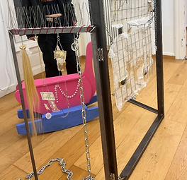Jewelry display with various necklaces, hair, earrings, and other accessories on display.