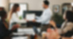 woman receiving award in an office