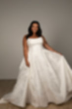 Stella York SY8084 strapless floral jacquard wedding gown showcasing elegant structured bodice and full skirt.