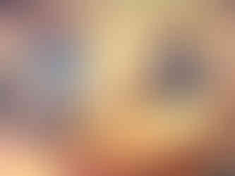 An aged and faded photo of two archaeologists relaxing with bottles of beer and talking