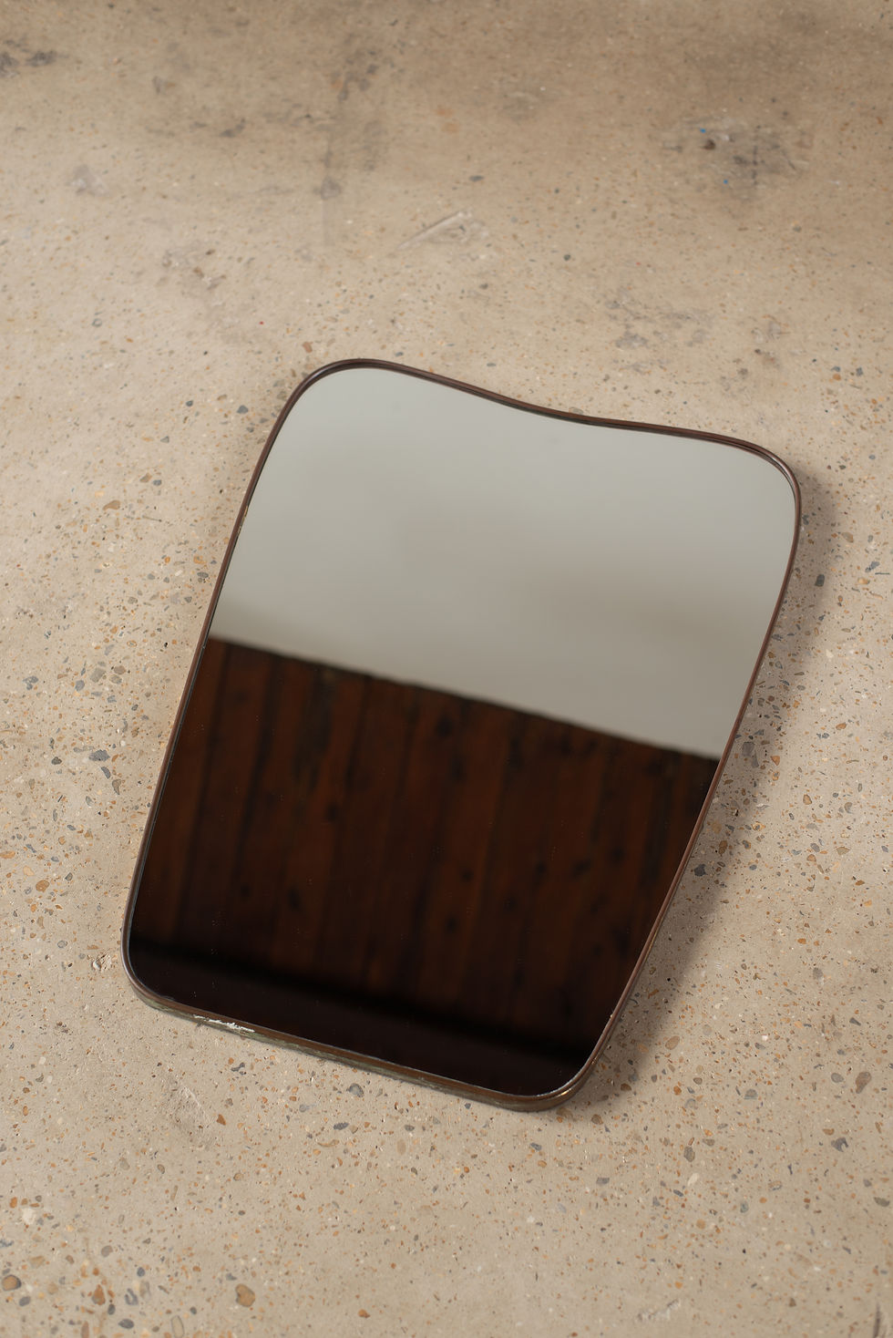 An original mid-century brass-framed mirror from Italy, C1950