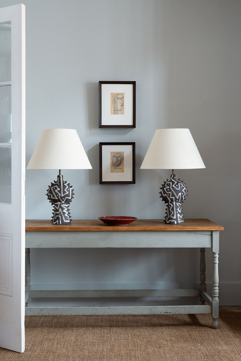 A pair of sculptural table lamps by London ceramics artist Talia Nidam Warshawsky.