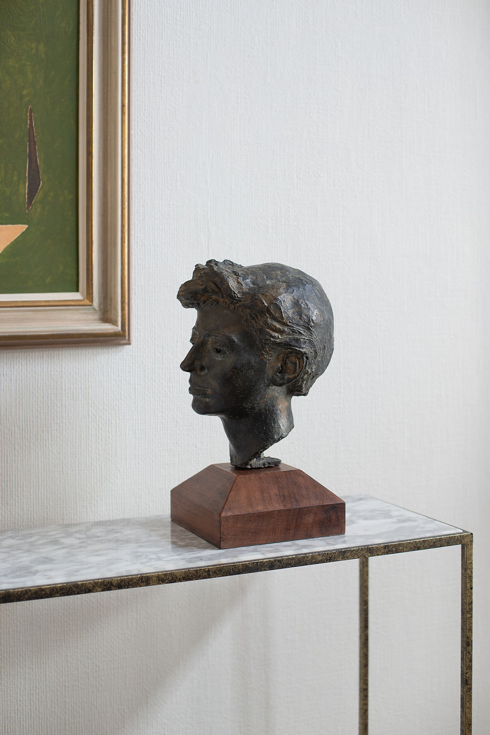 Thumbnail: A 20th Century patinated heavy bronze sculpture of an androgynous head.