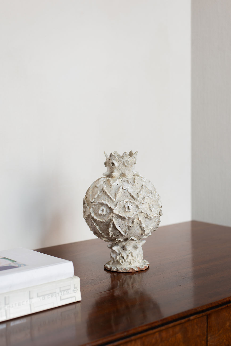 Thumbnail: Pomegranate Vessel by London ceramics artist Talia Nidam Warshawsky.