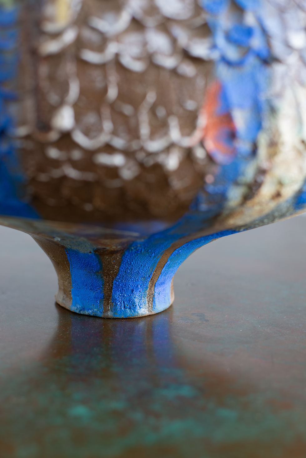 Thumbnail: A stoneware sculptural vessel with glaze and stains by artist Linda Lencovic.