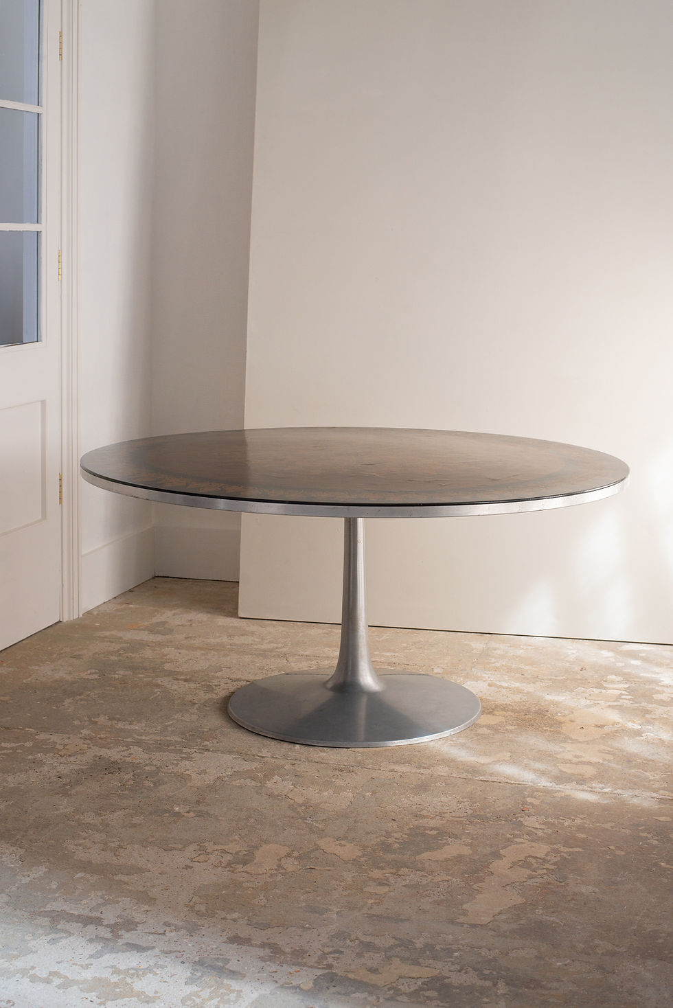 A Danish circular dining/ hall table, circa 1960s/70s.