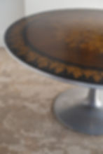 A Danish circular dining/ hall table, circa 1960s/70s.