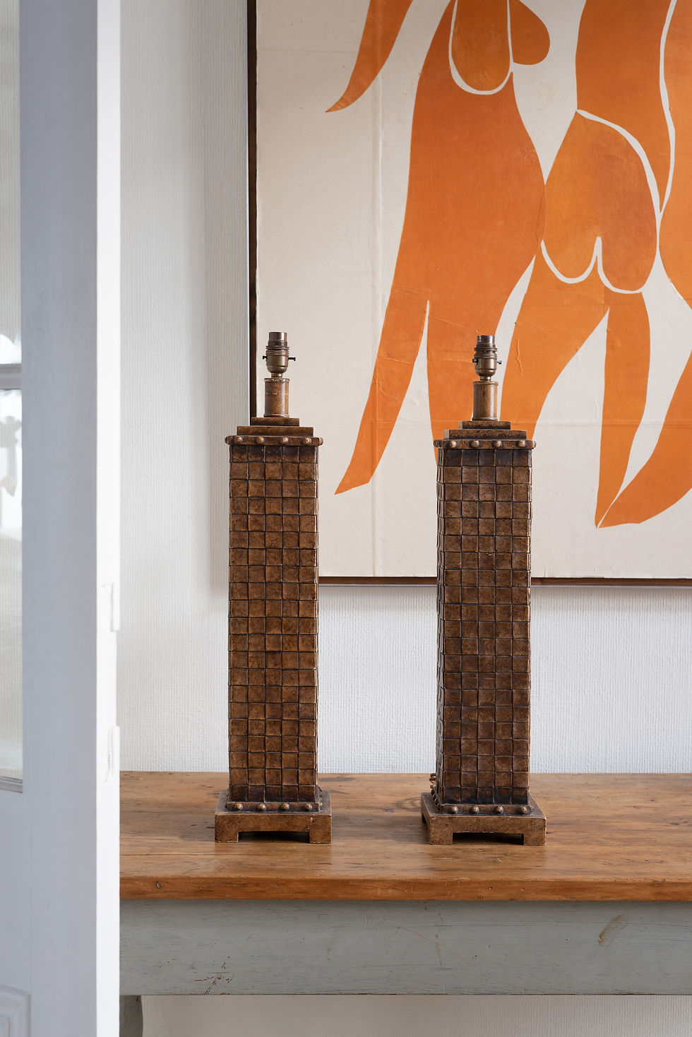 An unusual pair of imposing cast metal lamps in a woven style. Hand finished patina. In vintage condition. Possibly 1990’s.