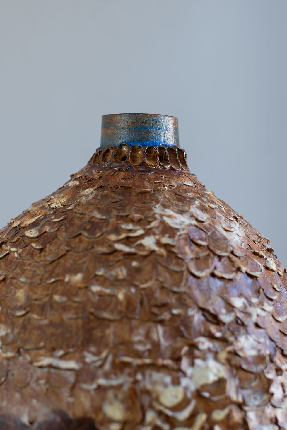 Thumbnail: A stoneware sculptural vessel with glaze and stains by artist Linda Lencovic.