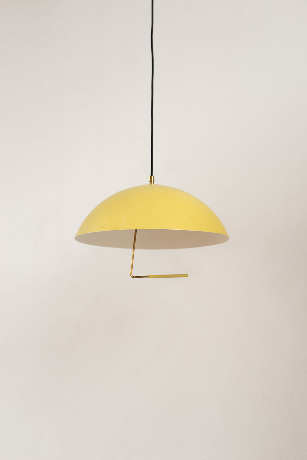An Italian counterweight ceiling pendant, with brass handle by Stilux, Milano, C1950/60