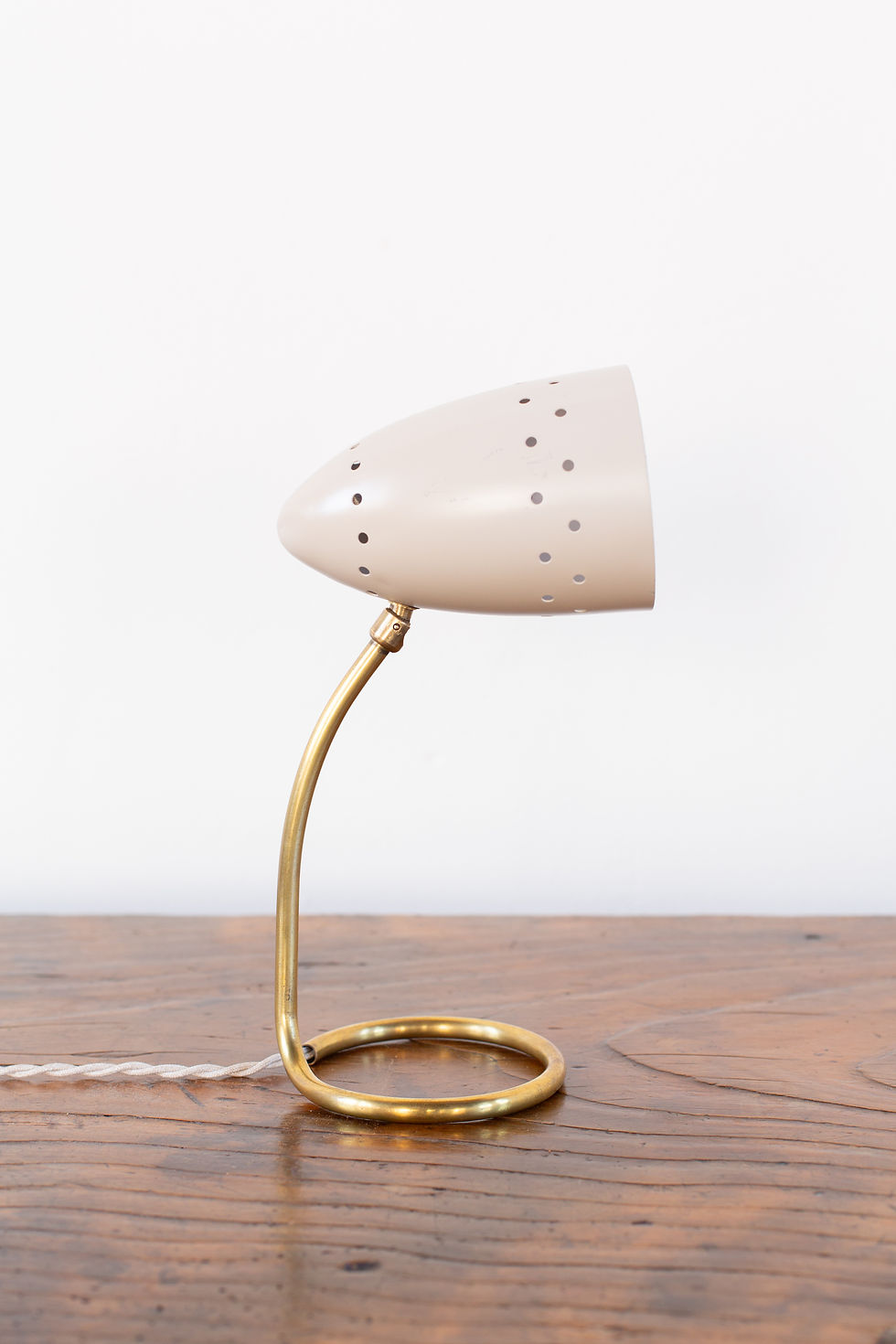 A petite brass and spun aluminium table lamp, attributed to Rupert Nikoll, Austria C1950/60