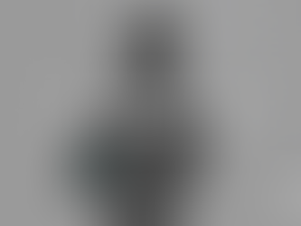 Initial Mile character, Karagado posing with arms crossed