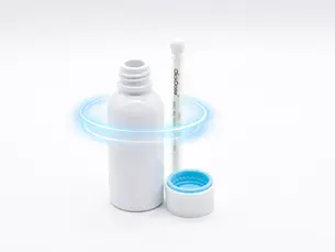 White plastic medicine bottle with detached blue child-resistant cap and ClickDose oral syringe placed beside it on a clean white background