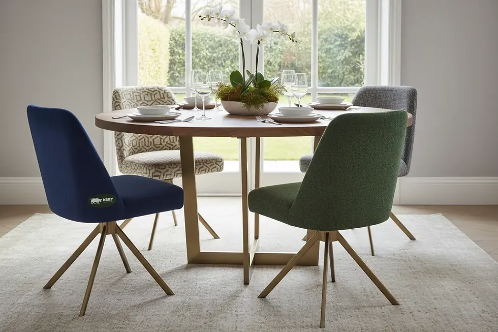 Modern upholstered dining chairs with swivel mechanisms around a dining table