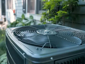 Running condenser fan motor.