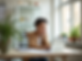 A-confident-student-working-at-a-clean-desk-with-a-laptop-in-a-sunny-modern-office.png