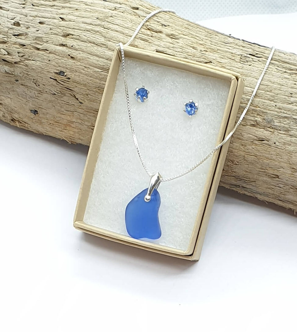 Cornflower blue sea glass and recycled sterling silver jewellery set, comprising of pendant and stud earrings