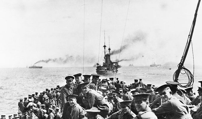 Men of the 11th battalion and 1st Field Company, Australian Engineers, assembled on the forecastle of HMS London at sea off Lemnos, 24 April 1915. The next morning they would leave the London to land on North Beach, Gallipoli. Australian War Memorial A02468