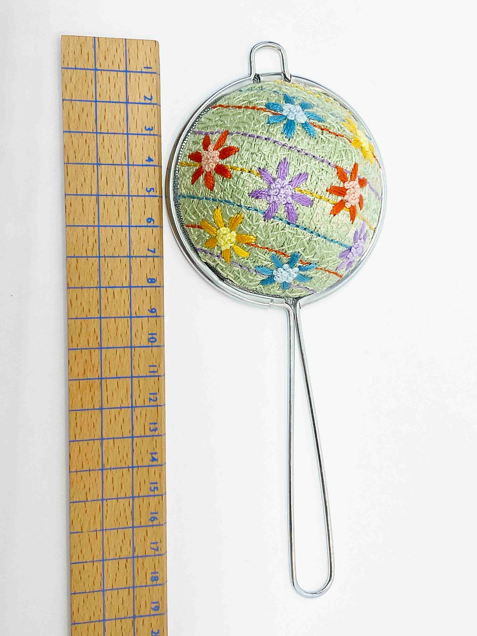 Thumbnail: Hand Embroidered Stainless Steel Tea Strainer - Spring Daisy (physical product)