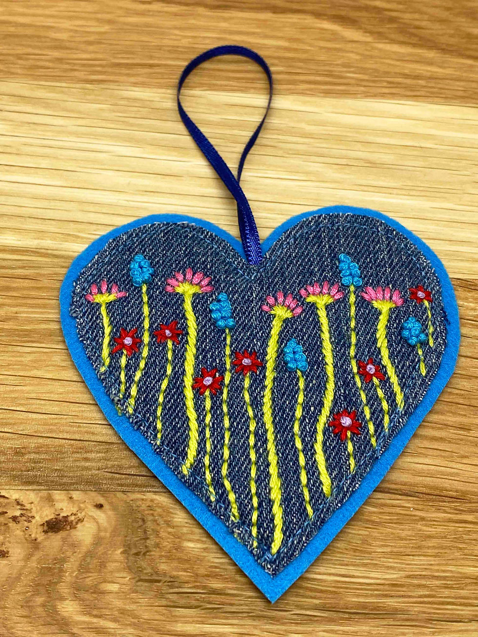 Thumbnail: Hand Embroidered Hanging Heart Decoration - Meadow Theme (choice of design)