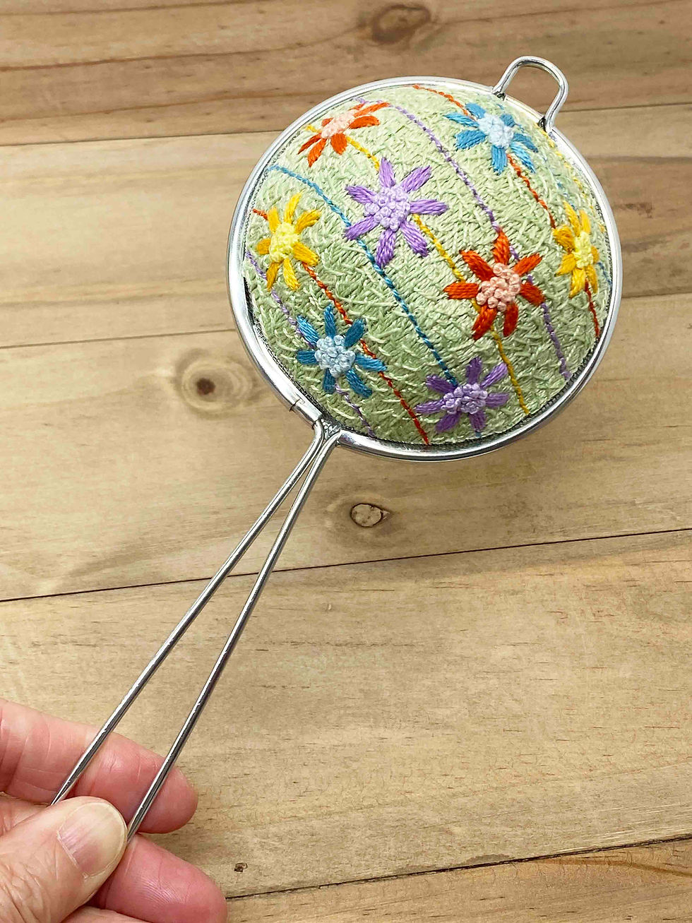 Thumbnail: Hand Embroidered Stainless Steel Tea Strainer - Spring Daisy (physical product)