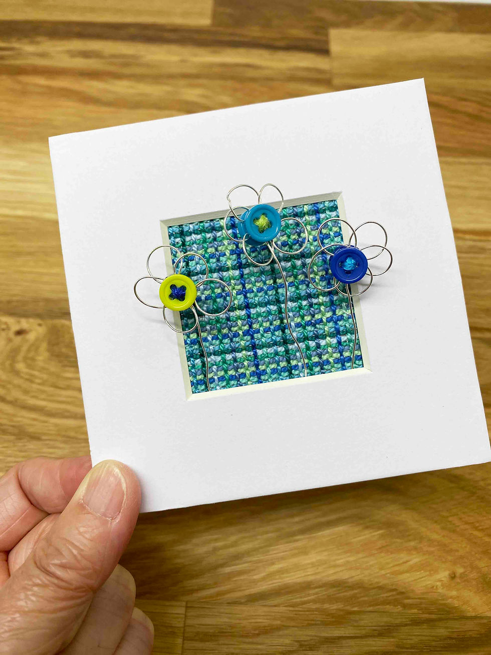 Thumbnail: Hand Embroidered Picture in Shadow Box Frame - Blue Daisy on Metal