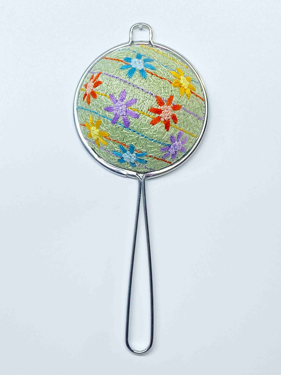 Thumbnail: Hand Embroidered Stainless Steel Tea Strainer - Spring Daisy (physical product)