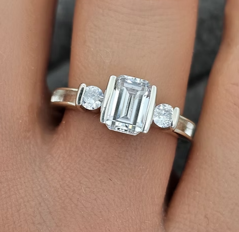 Thumbnail: Summer Silver Emerald Cut Memorial Ring - top view shown on hand