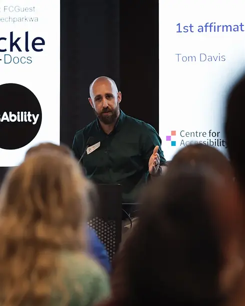Tom Davis speaking in a conference