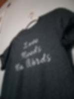 Black shirt that says "Love Needs No Words". Available for purchase through website. 