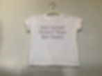 White shirt that says "Non-Verbal Doesn't Mean Not Aware". Available for purchase through website. 