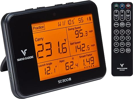 Voice Caddie SC300i Portable Golf Launch Monitor next to an included remote controller