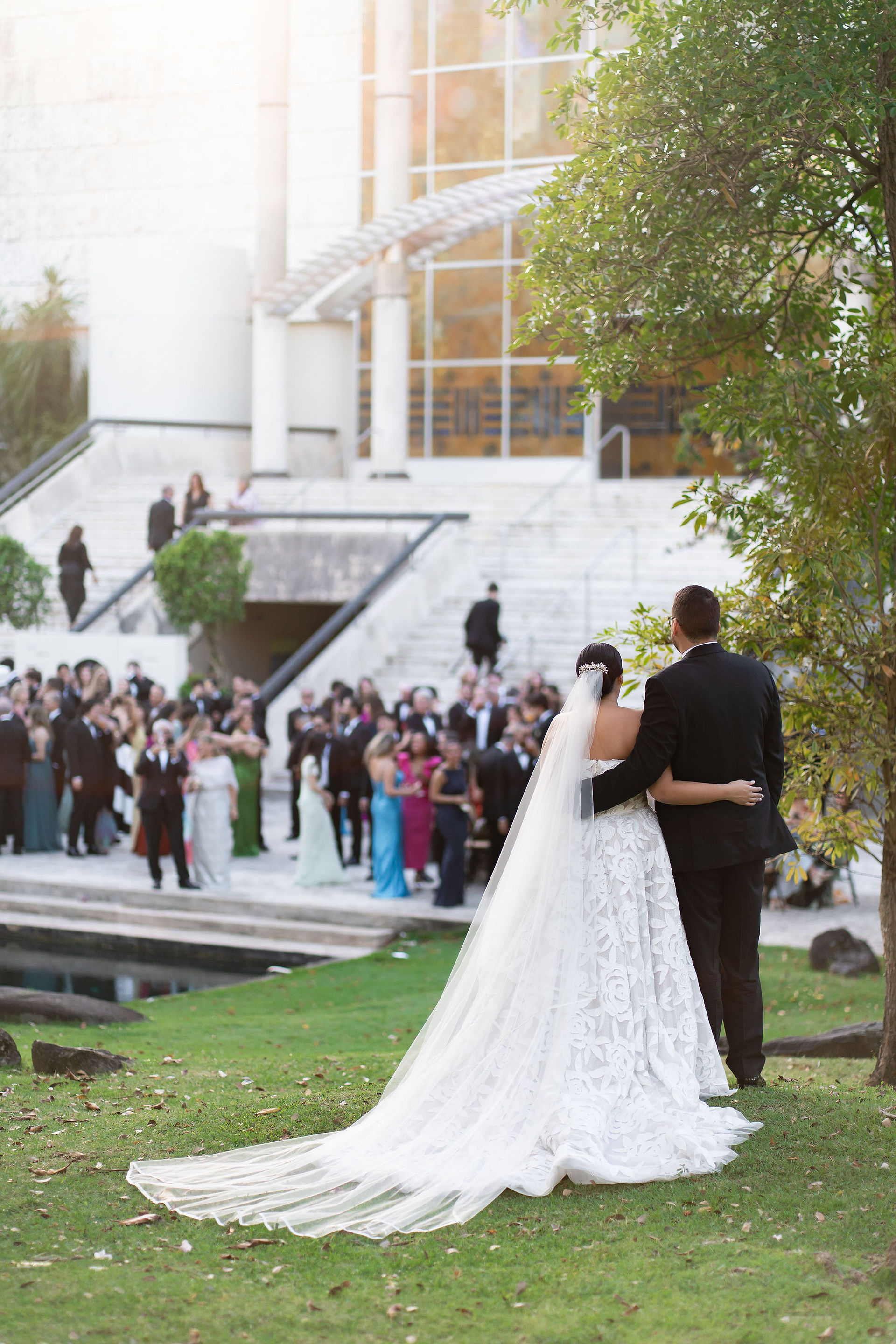 Bride and groom overlooking their reception at El museo de Arte de Puerto Rico