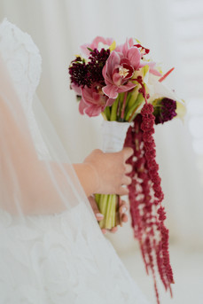 Bride hoolding flower bouquet at Hotel La Concha in San Juan Puerto Rico