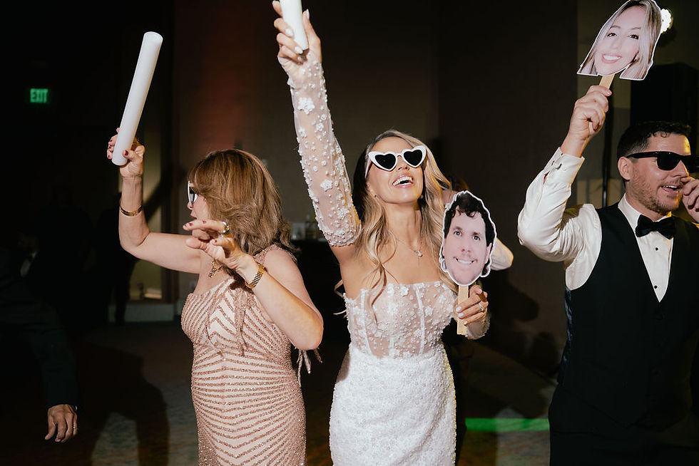 Bride and groom partying at Bride and father dancing at the wedding reception at San Juan Marriott Resort and Stelaris Casino ballroom