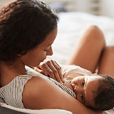 Mother Breastfeeding her newborn baby