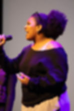 Musical theatre junior Lila McClelland performs a song at the LP Black Student Union Showcase Feb. 28. Photo by Logan Nagele.