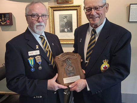 Bill Haire, President (L) presents Wayne Vienneau with the Legionaire of the Year Award.