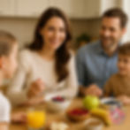 A family sitting together at tje breakfast table eating a high fibre breakfast