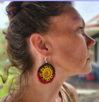 Thumbnail: Handwoven earring with wooden centre. Black, Yellow & Red 5cm diameter
