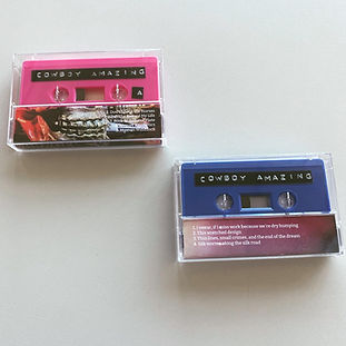 two cassettes with printed j cards