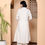 Thumbnail: This is a product image, the product is a Off White Tunic Set