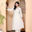 Thumbnail: This is a product image, the product is a Off White Tunic Set