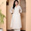 Thumbnail: This is a product image, the product is a Off White Tunic Set