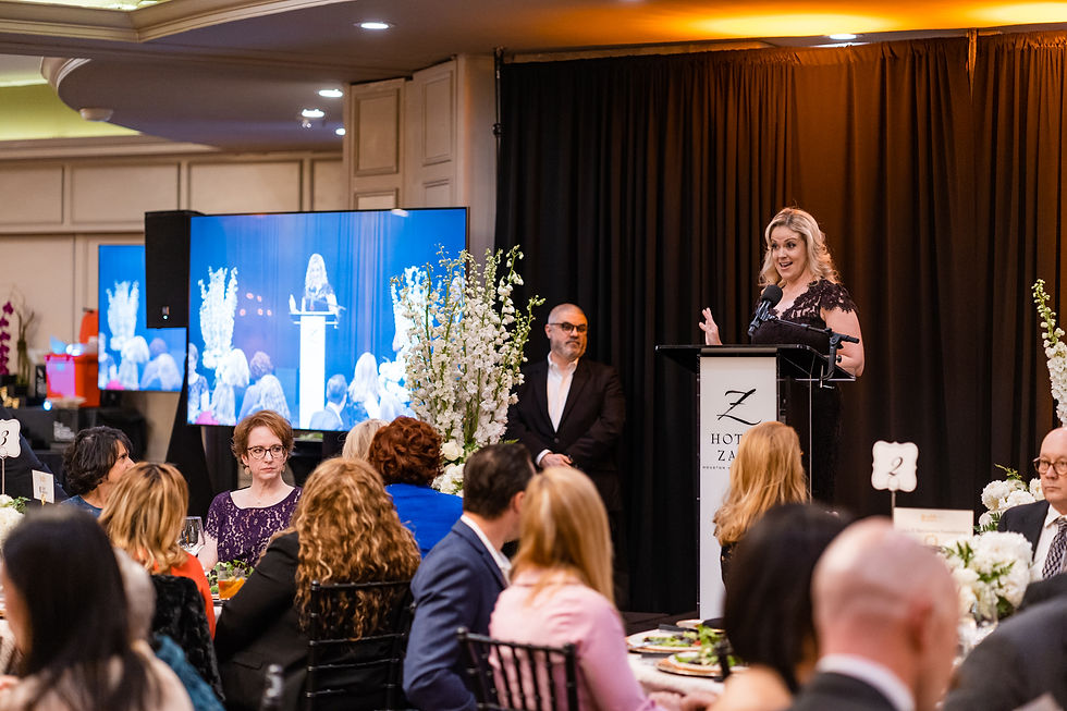 Maggie Flecknoe on stage by JH Photography