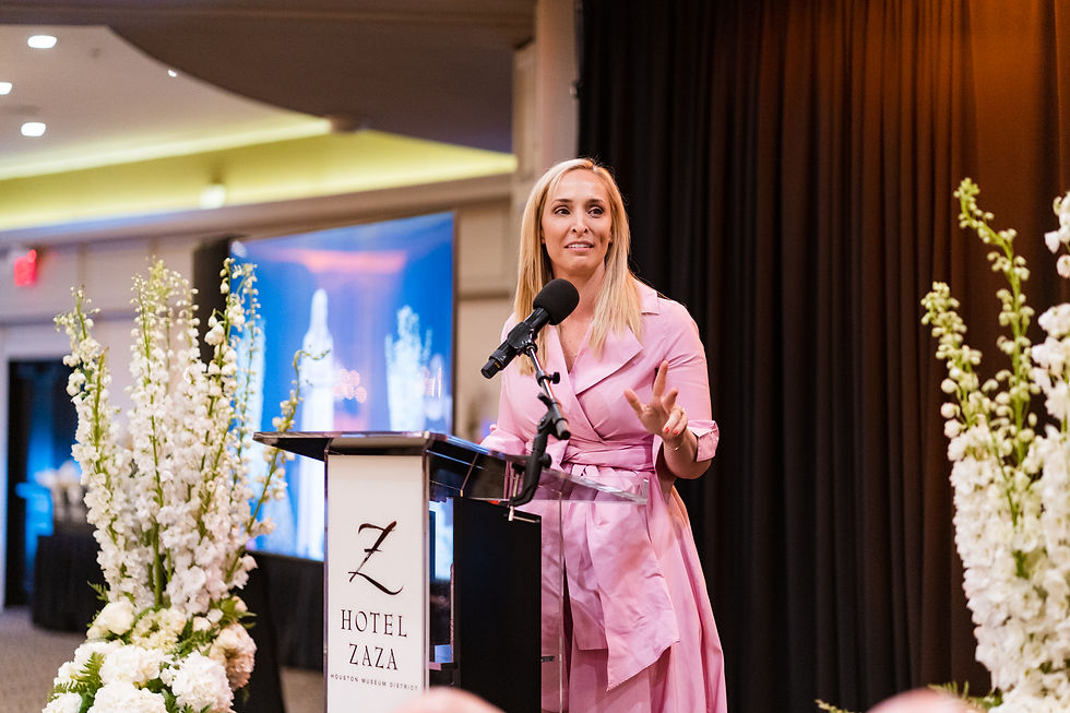 Elizabeth McIngvale, Ph.D., LCSW on stage by JH Photography